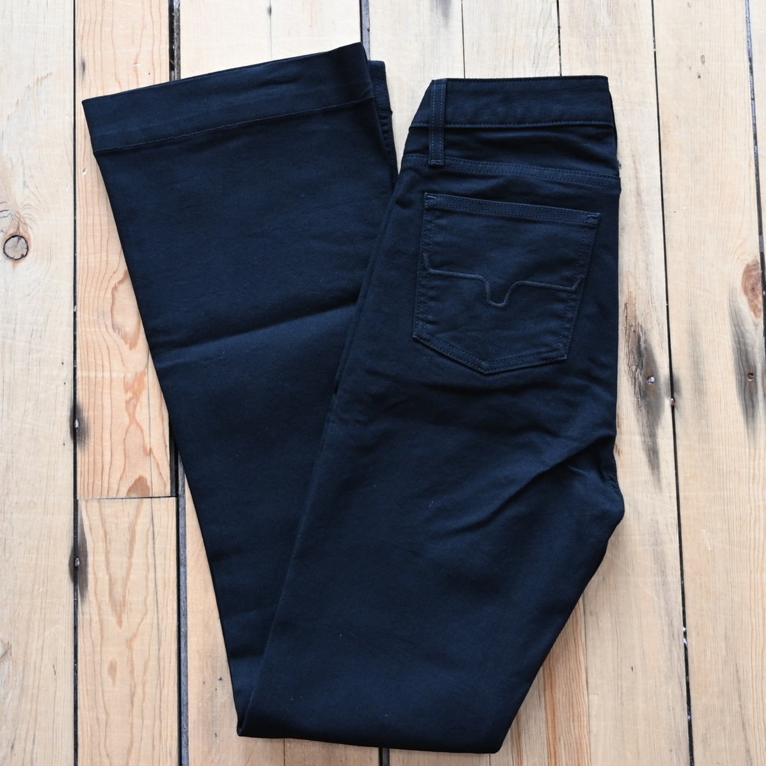 View of Kimes Ranch Jennifer Jeans in Black, showcasing ultra high rise and super wide flare leg