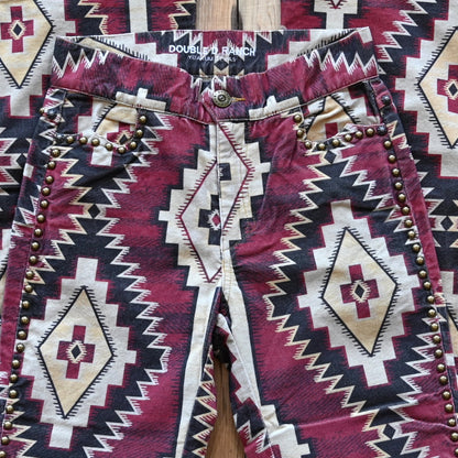 View of Double D Ranch Left Behind Pants – Traditional rug pattern with brass accents for a Western-inspired design