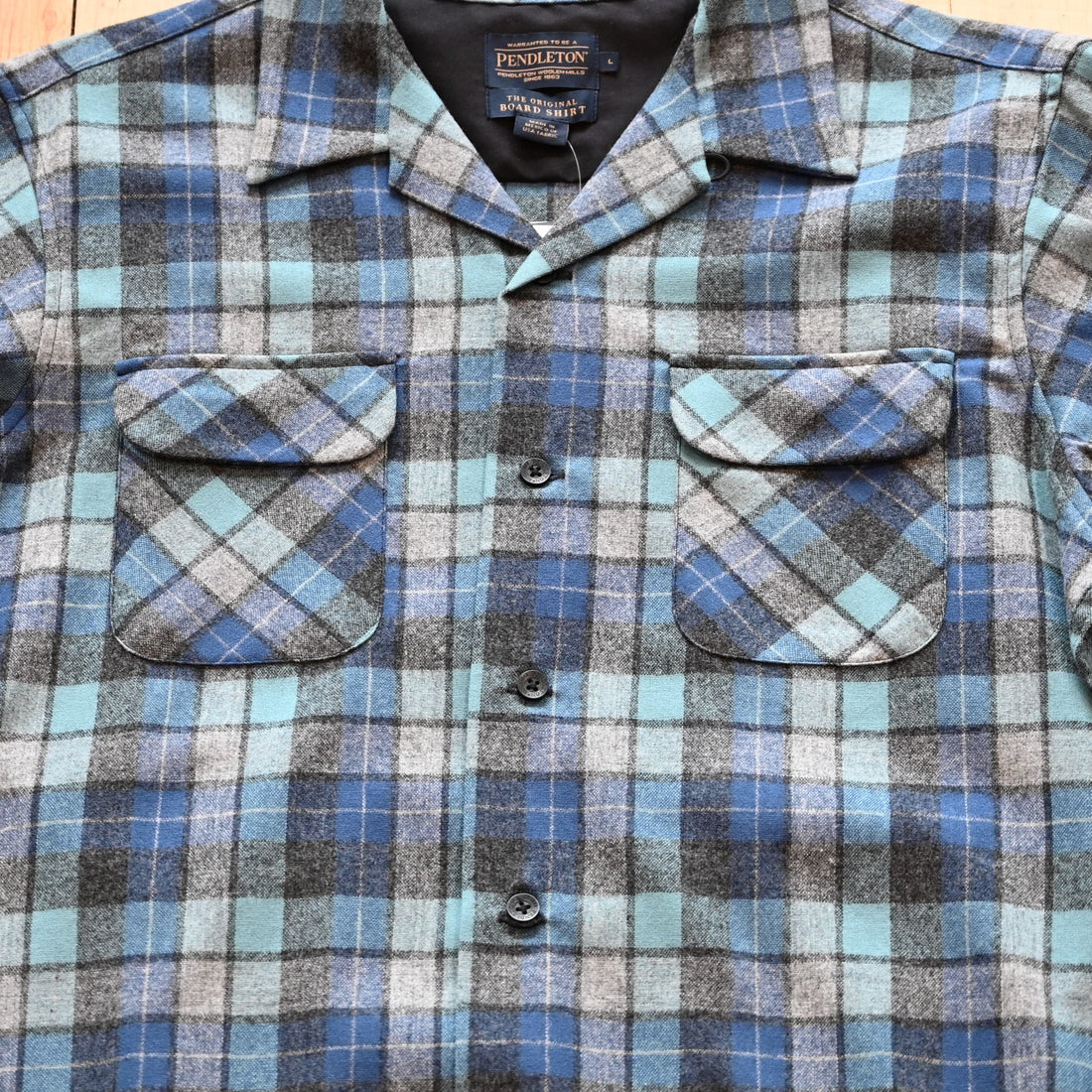 View of Pendleton men’s wool board shirt in Blue Original Soft Plaid with square hem and flap chest pockets