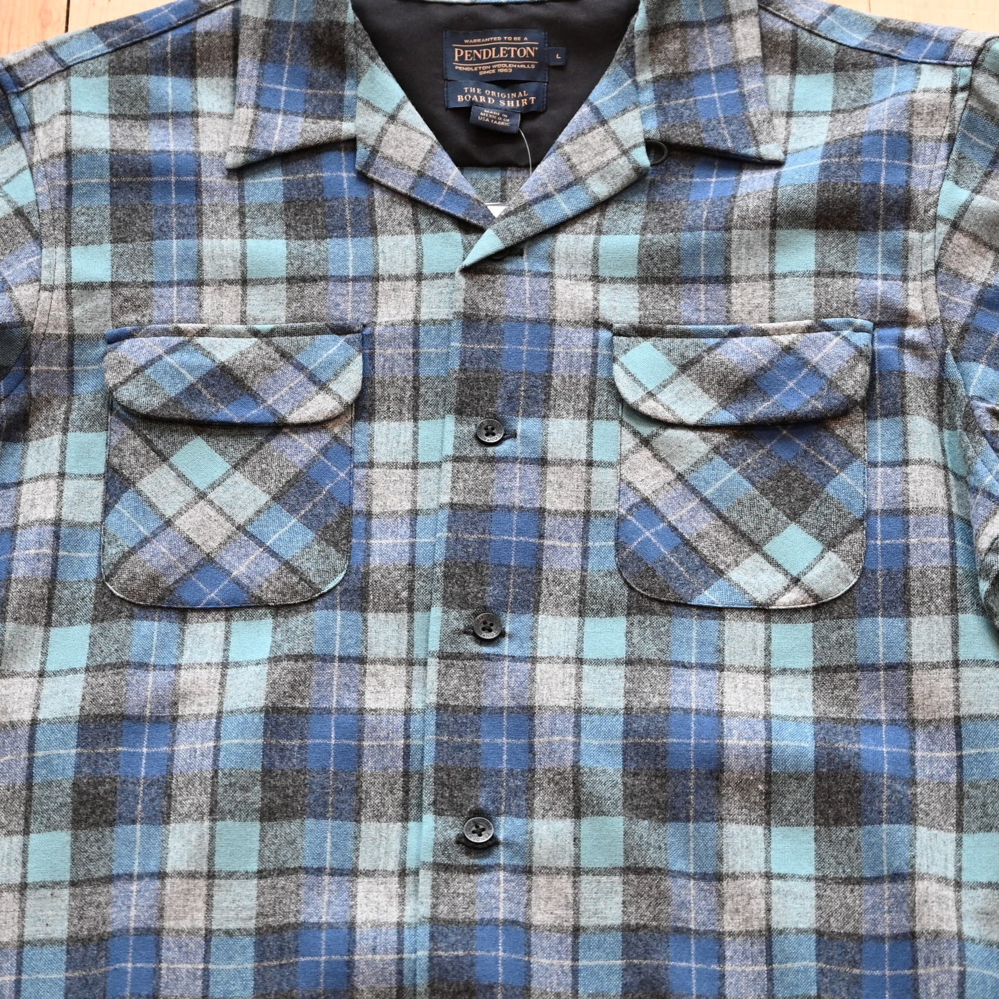 View of Pendleton men’s wool board shirt in Blue Original Soft Plaid with square hem and flap chest pockets