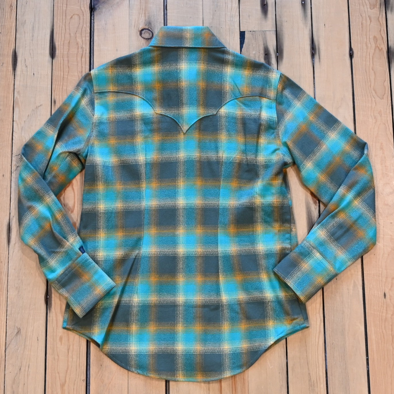 Ladies plush green and turquoise plaid flannel Western shirt with sawtooth pockets and diamond snaps