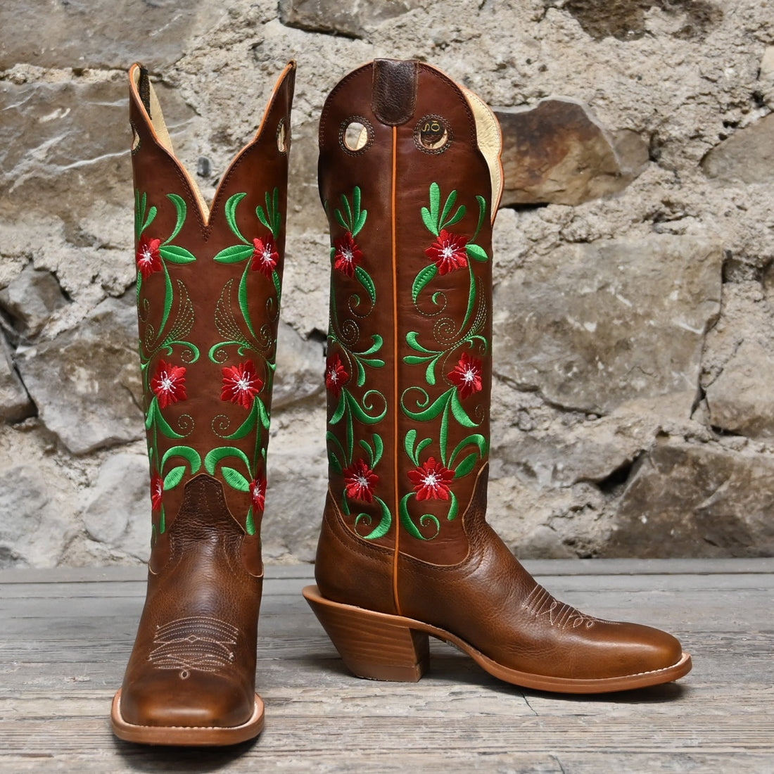 View of Hondo 16" cowboy boot with rust volcano top, red floral embroidery, rust oil tan vamp, and pull holes