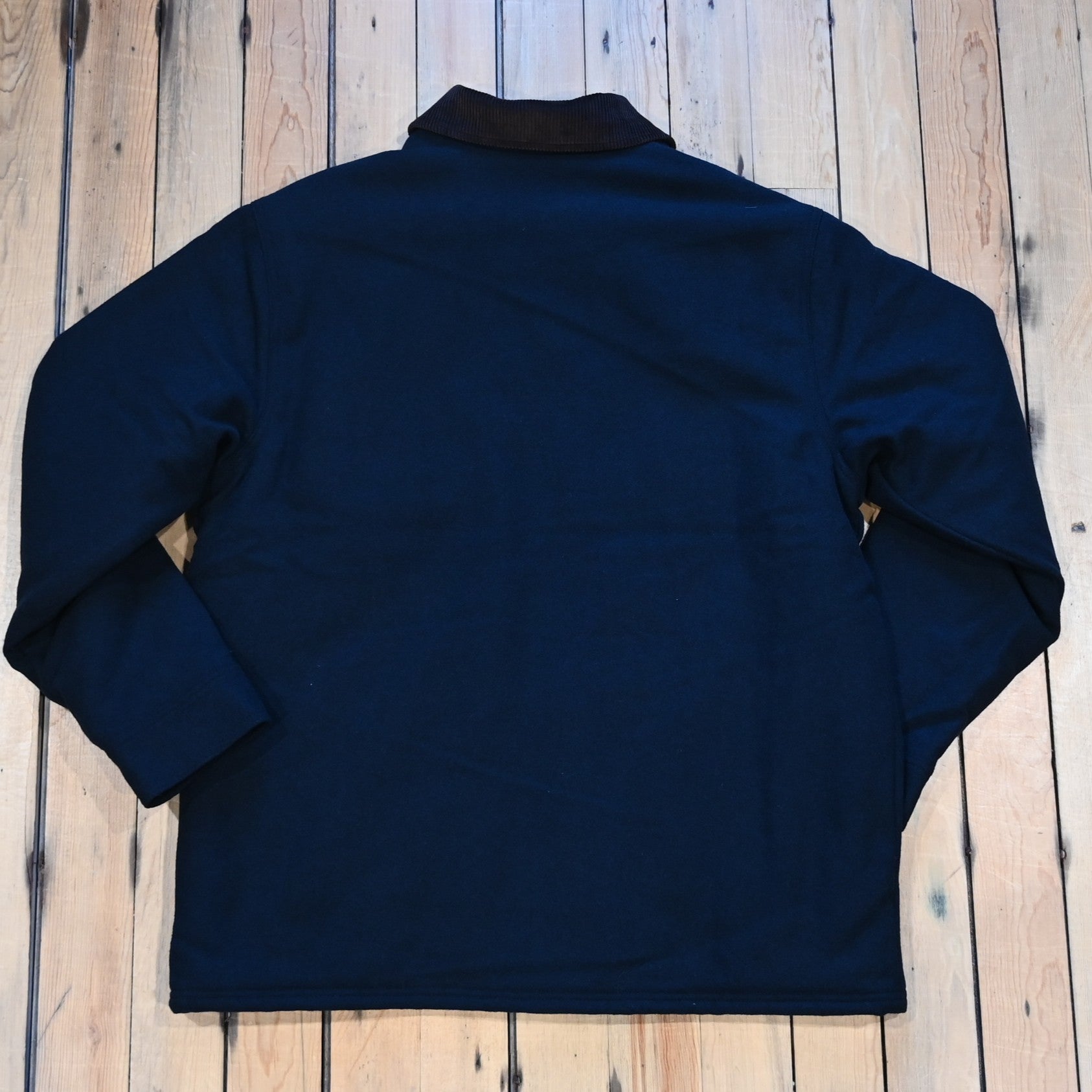 Filson Spokane Insulated Cruiser Jacket in navy wool-blend with snap front and cargo pockets