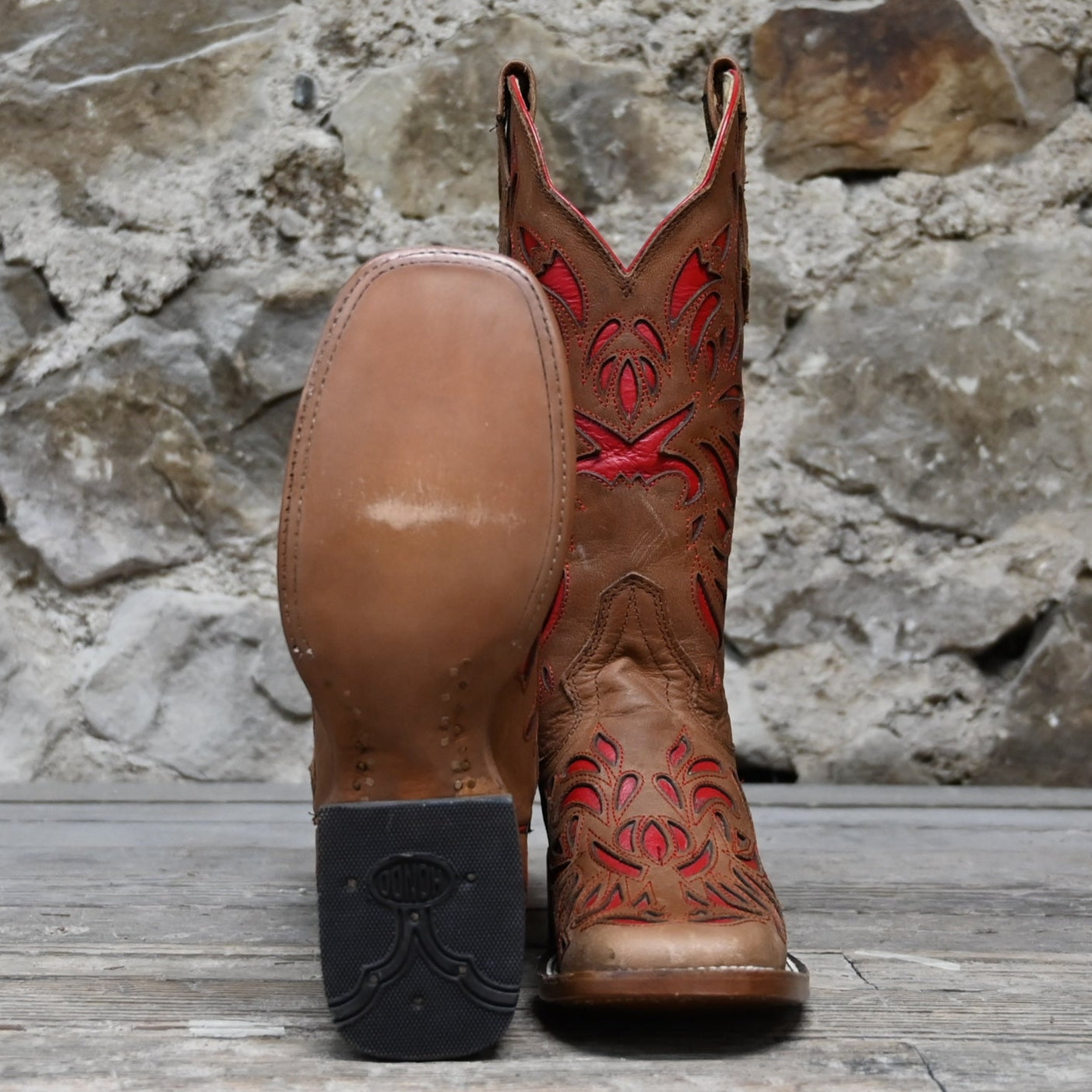 View of Hondo 13" cowboy boot in maple vintage leather with red inlays and wide square toe