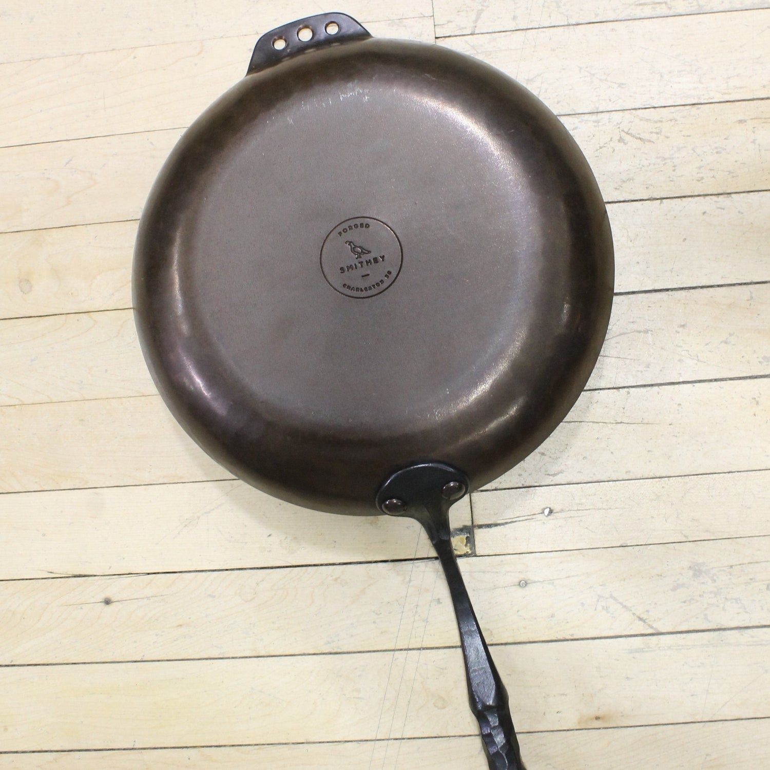 View of Smithey 12&quot; Carbon Steel Farmhouse Skillet – Hand-forged pan with hammered handle and pre-seasoned interior