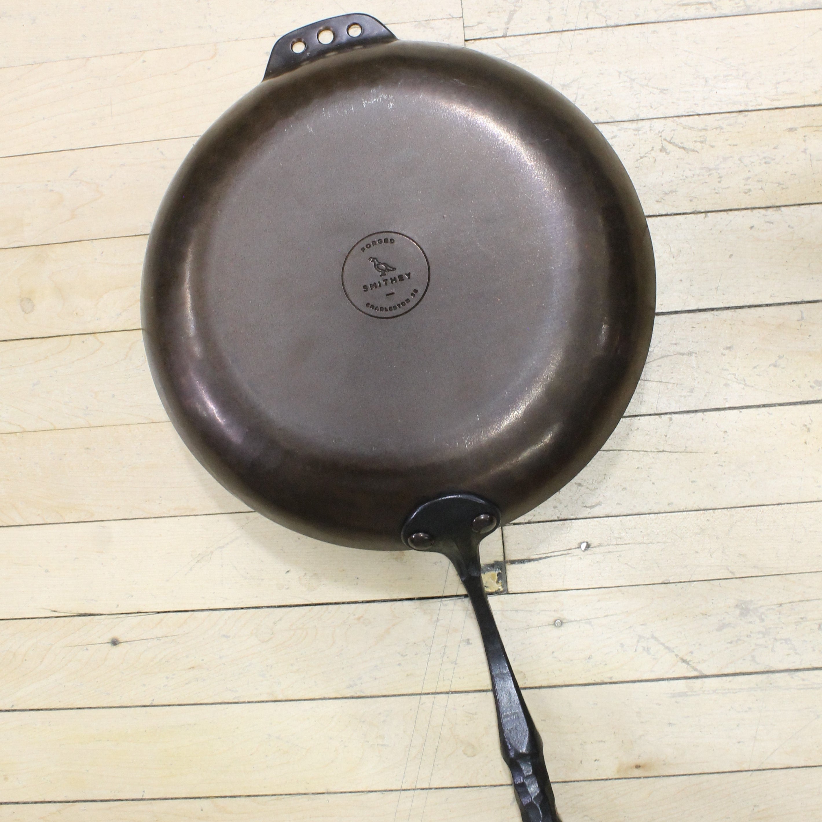 View of Smithey 12&quot; Carbon Steel Farmhouse Skillet – Hand-forged pan with hammered handle and pre-seasoned interior