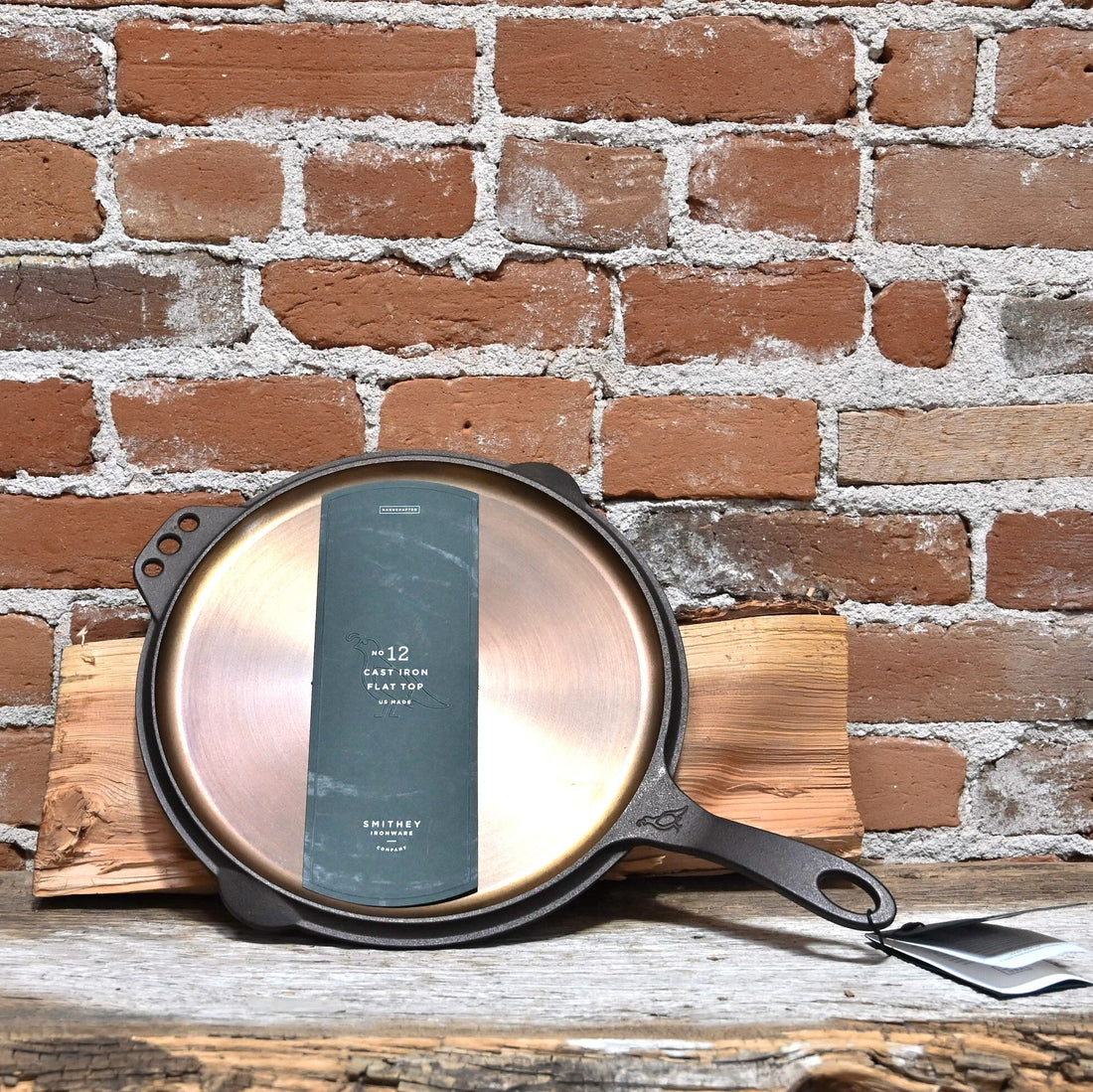 View of Smithey Ironware No. 12 Flat Top Griddle made from cast iron with a polished surface