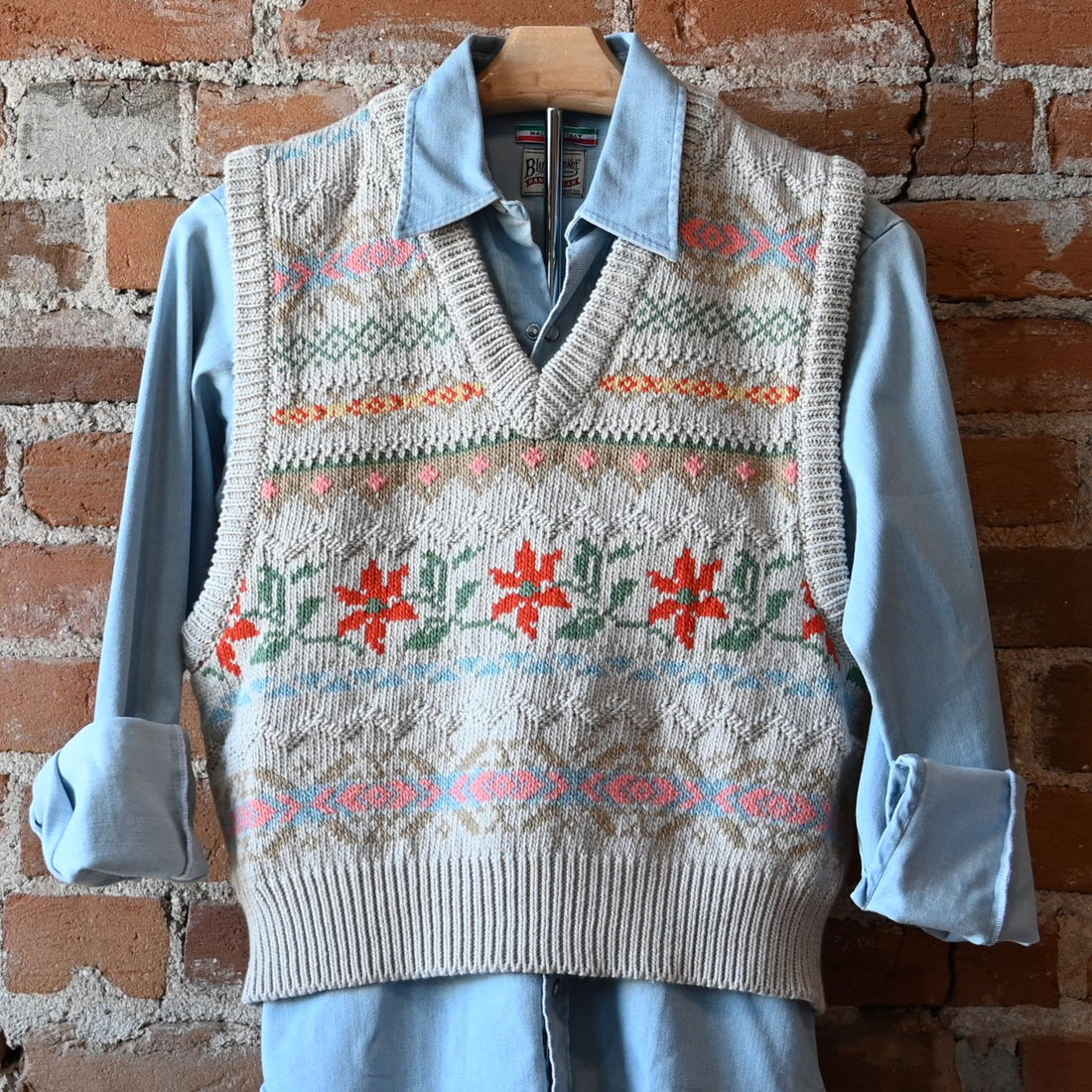 View of Filson Ladies 3GG Jacquard Fairisle Flower Vest featuring a floral jacquard-knit pattern and rib-knit collar