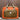 View of Filson Surveyor Pullman Pack in Dark Tan/Flame, showcasing durable Cordura® nylon construction and versatile carry options

