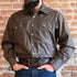 View of Rockmount greige western shirt with arrow print, sawtooth pockets, and diamond snaps