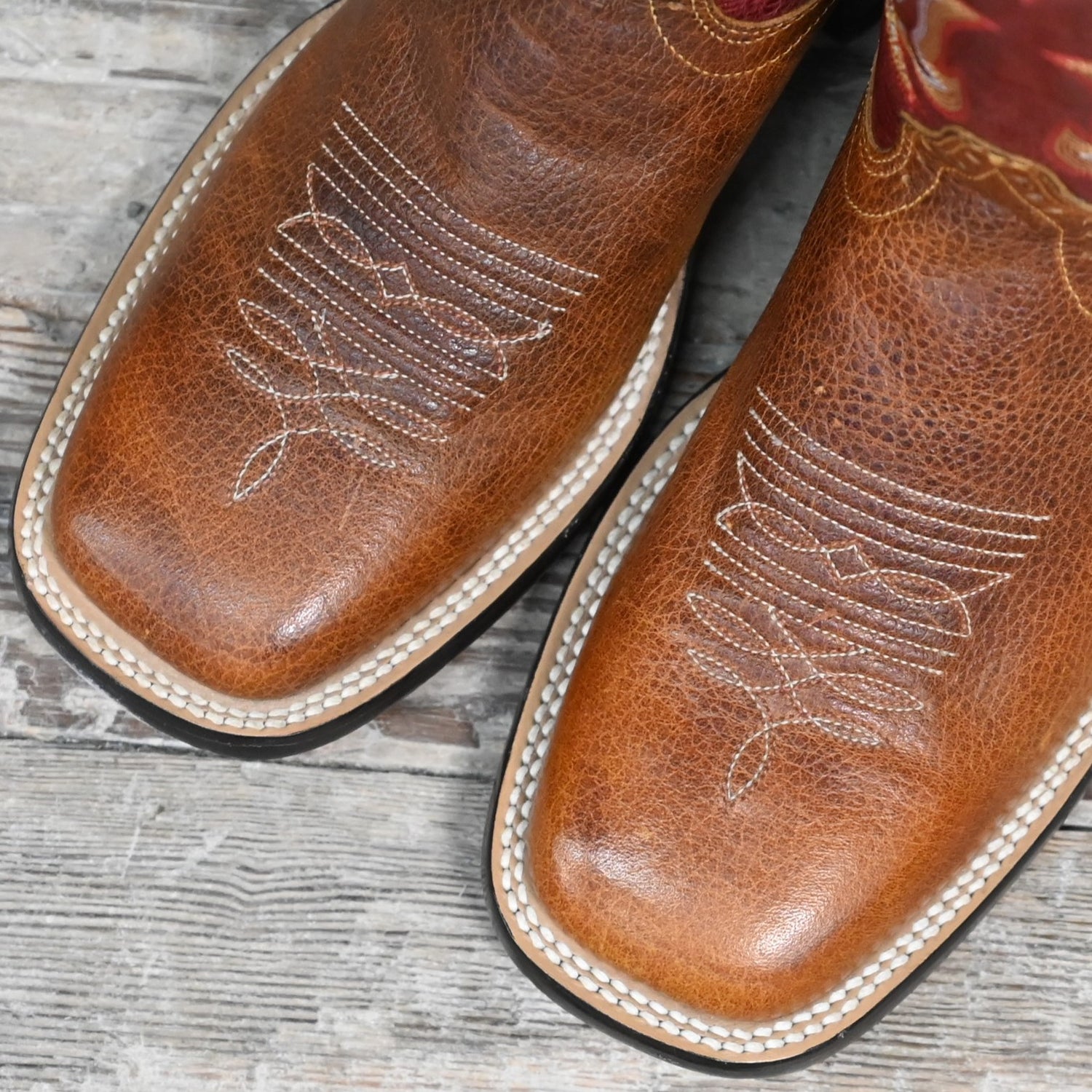 View of Hondo 13&quot; cowboy boot with red volcano top, rust oil tan vamp, and wide square toe