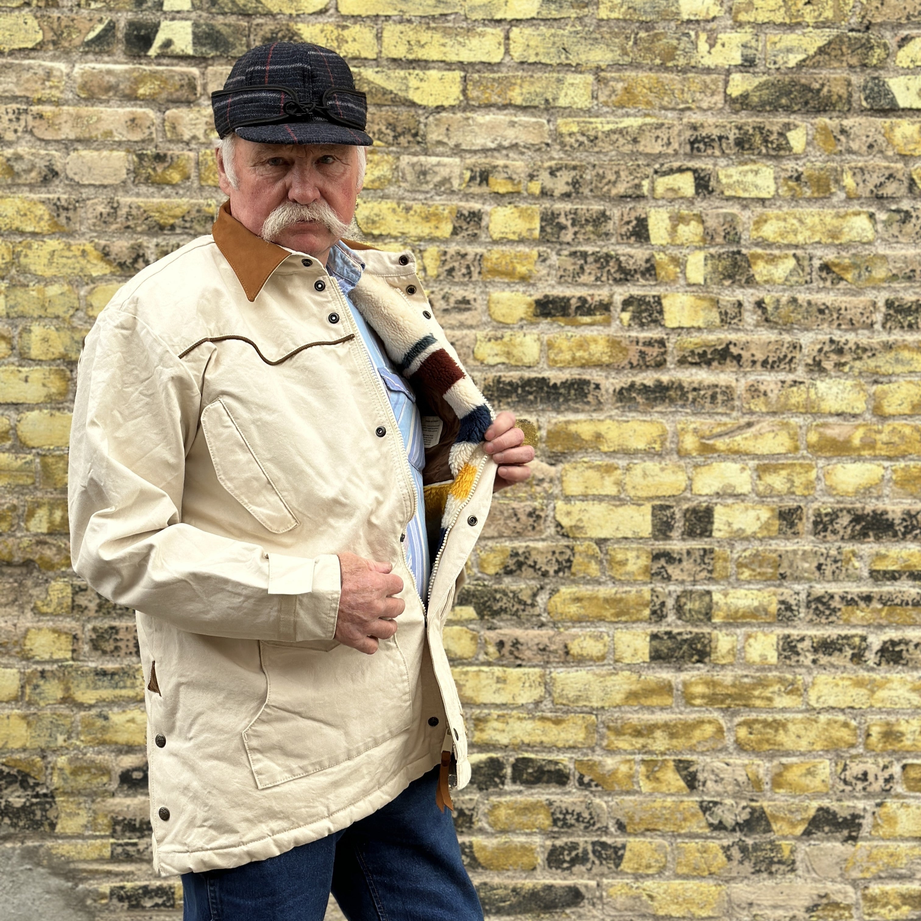 View of Natural canvas Schaefer Durango Drifter Coat with leather collar and fleece lining