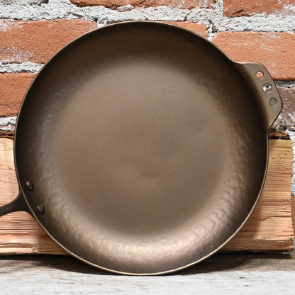 View of Smithey 12&quot; Carbon Steel Farmhouse Skillet – Hand-forged pan with hammered handle and pre-seasoned interior