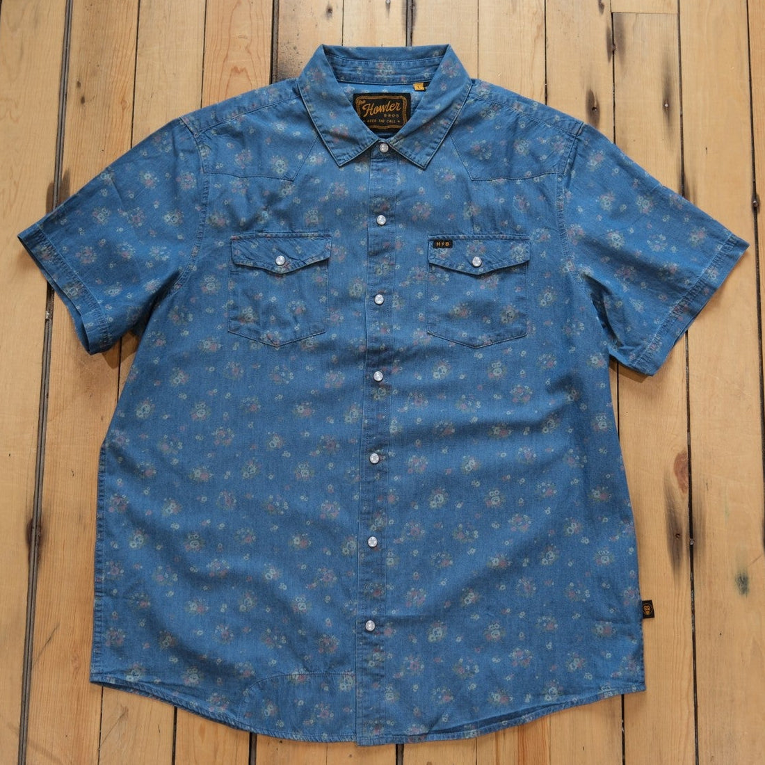 Howler Bros H-Bar-B Snapshirt in Bouquets Washed Indigo with floral print.