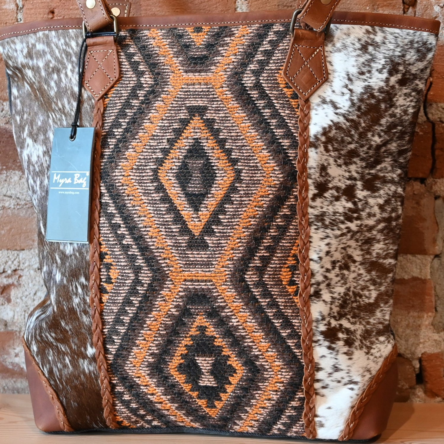 Myra Stone Valley tote bag with leather, hairon, and woven rug design