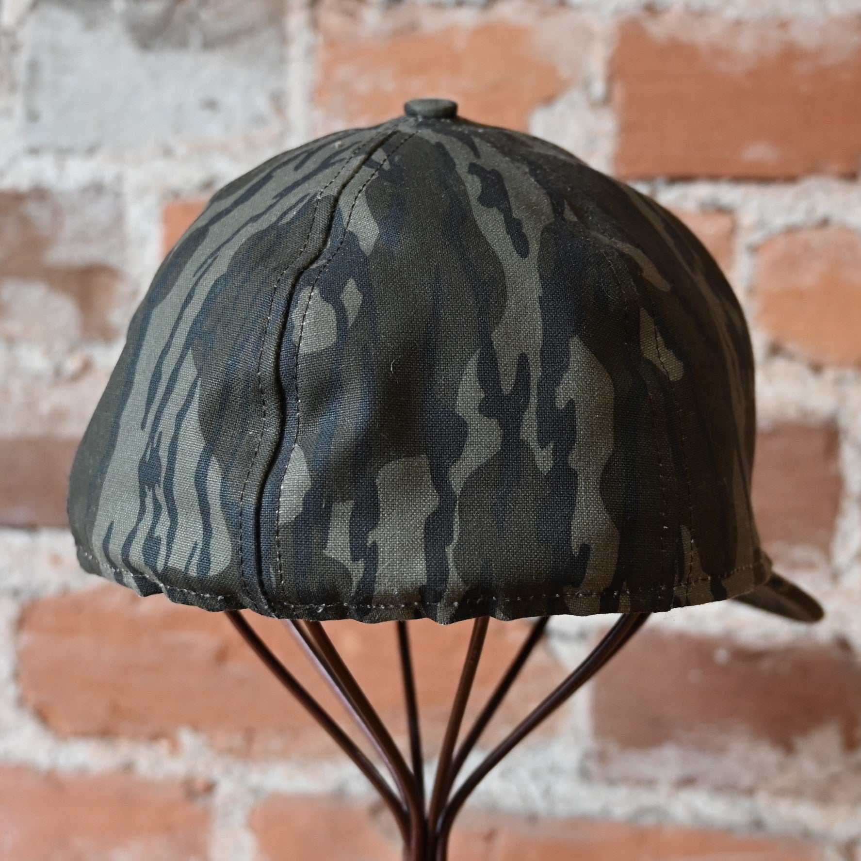 Filson insulated tin cloth cap mossy oak bottomland camouflage with earflaps