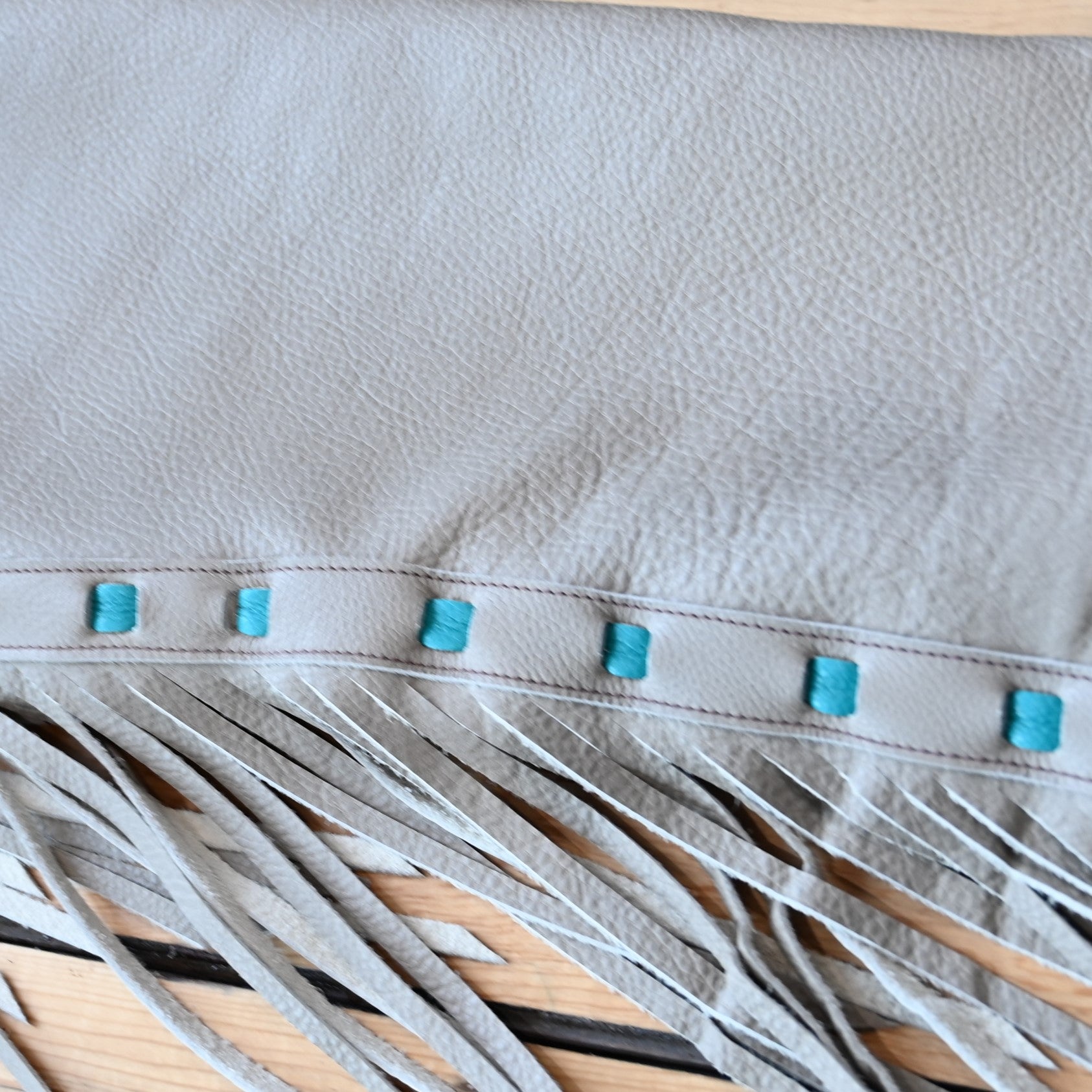 View of K Bar J Borderline Versatility Chap in Small with fringe and leather border