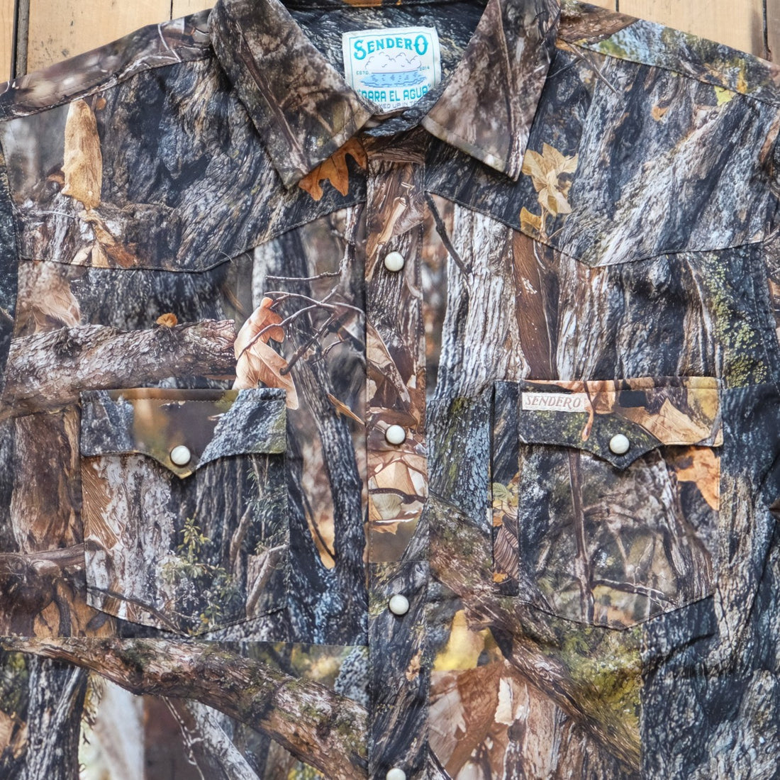 Sendero Confluence Tech Long Sleeve Shirt in Will Tree Camo featuring classic pearl snaps and a tailored western fit.