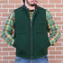 View of Filson Lined Mackinaw Wool Work Vest in Dark Spruce and Charcoal featuring zipper-front closure, wool-blend rib-knit collar, and multiple pockets