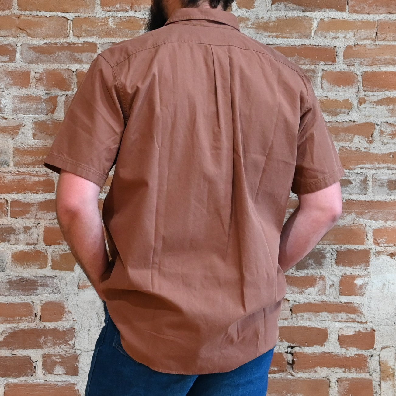 View of Filson Alaskan Guide Shirt featuring lightweight cotton twill fabric, short sleeves, and gusseted chest pockets