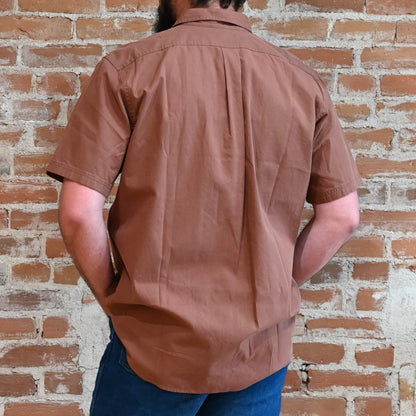 View of Filson Alaskan Guide Shirt featuring lightweight cotton twill fabric, short sleeves, and gusseted chest pockets