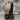 View of Horse Power 11" High Noon boot with emerald suede vamp, tan and black bison top, cutter toe, rainbow stitching, and pull straps