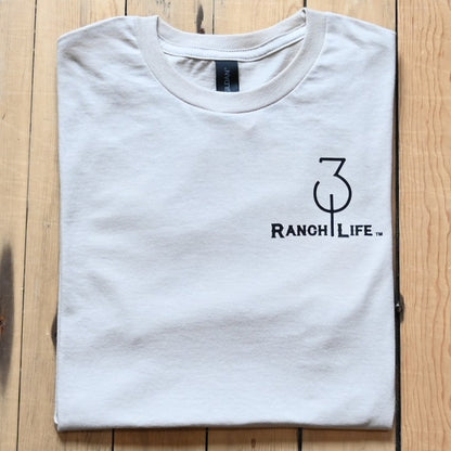 View of Sand unisex T‑shirt with “Make America Cowboy Again” graphic from 310 Ranch Life