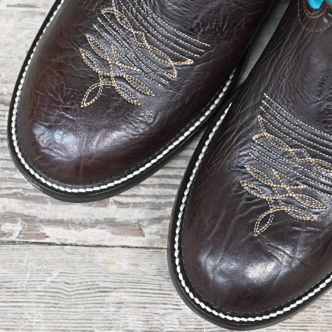 View of Hondo 13&quot; cowboy boot with turquoise top, brown shoulder vamp, wide round toe, and spur ledge
