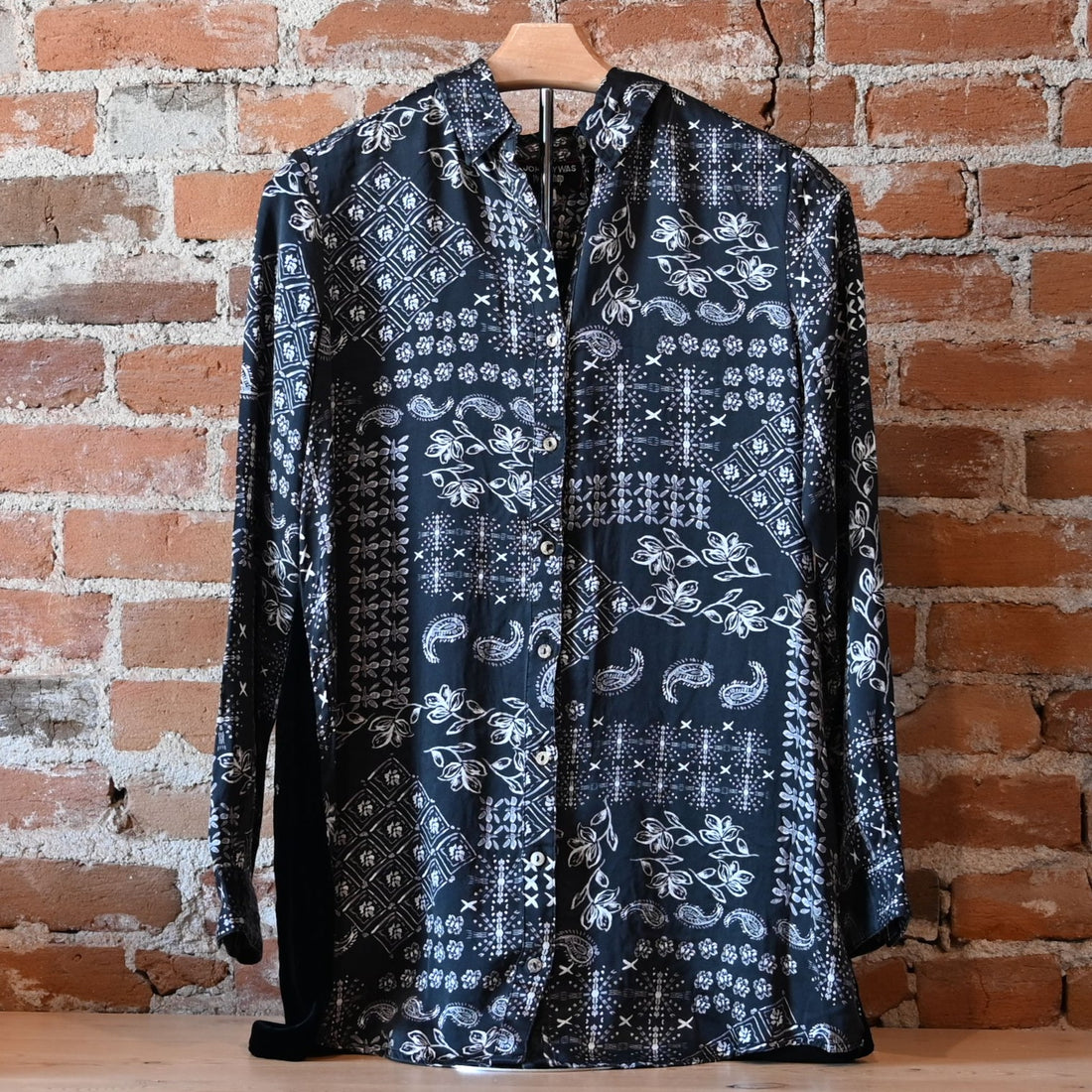 View of Johnny Was multicolor velvet shirt with floral embroidery on back