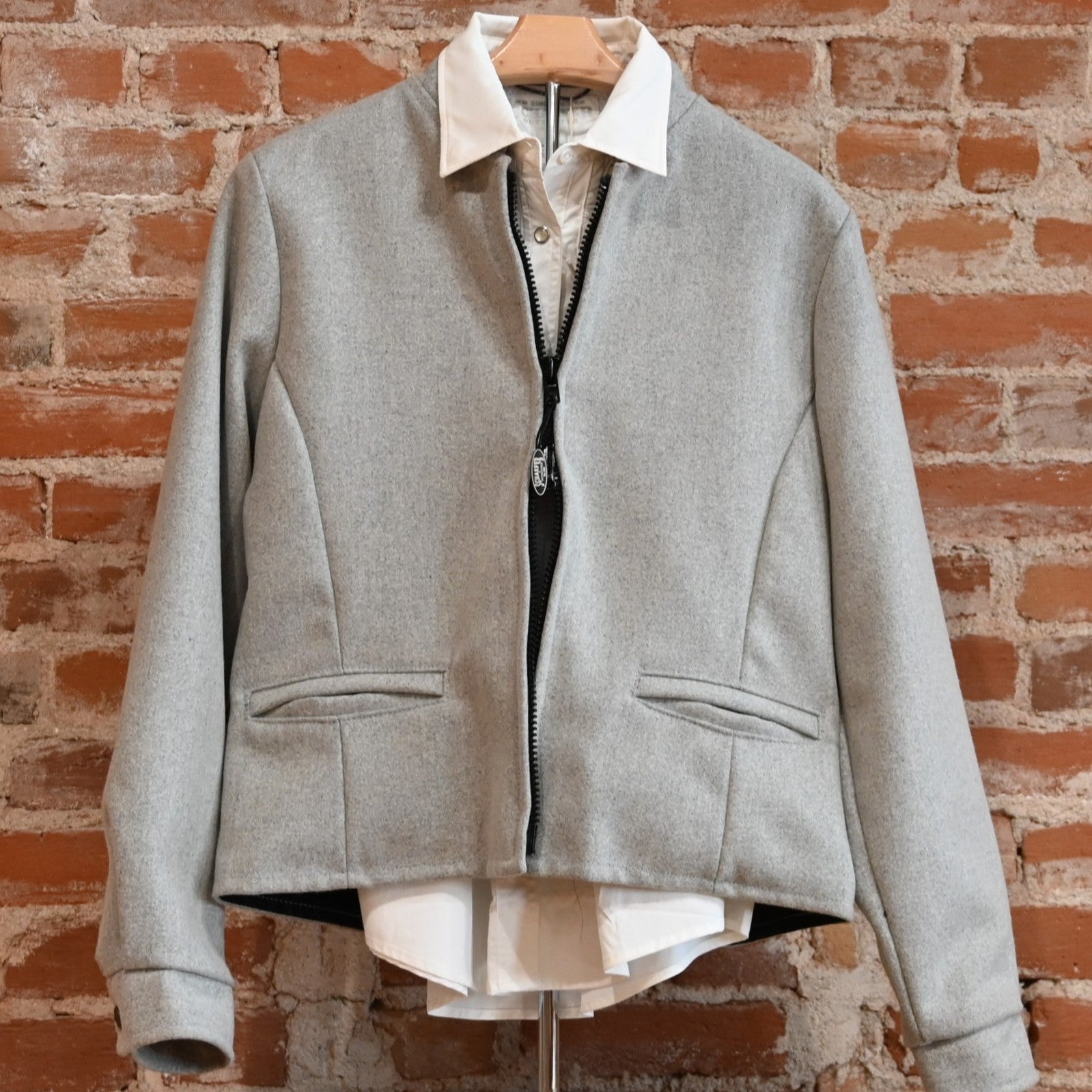 View of Schaefer ladies wool jacket in solid gray, red, or black with western yoke and zip front