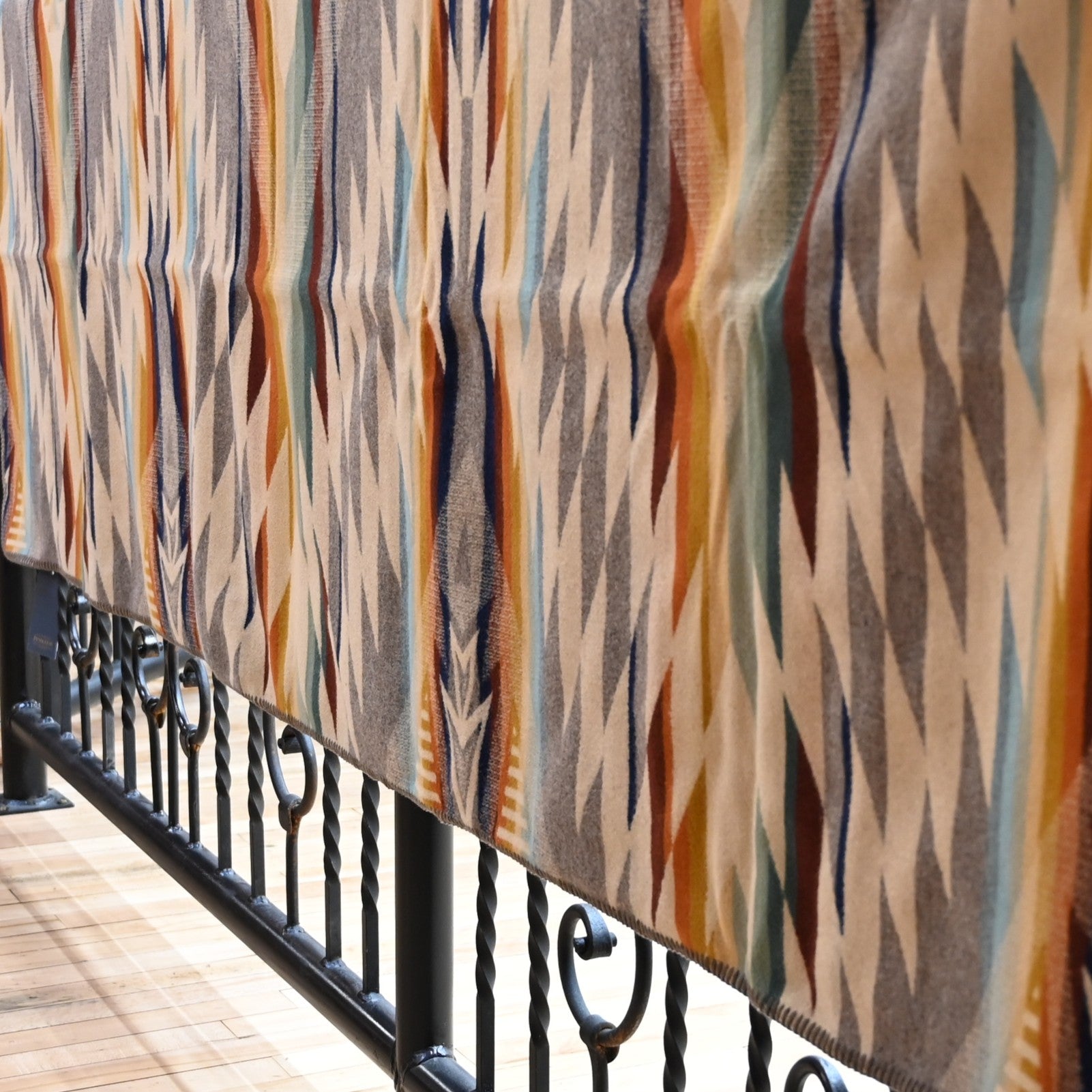 View of Pendleton Summerland Queen blanket in Taupe Multi with reversible jacquard design