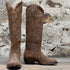View of Hyer KINSLEY 16" boots showcasing Dijon waxy suede vamp and upper with retro round toe and Western underslung leather stacked heel