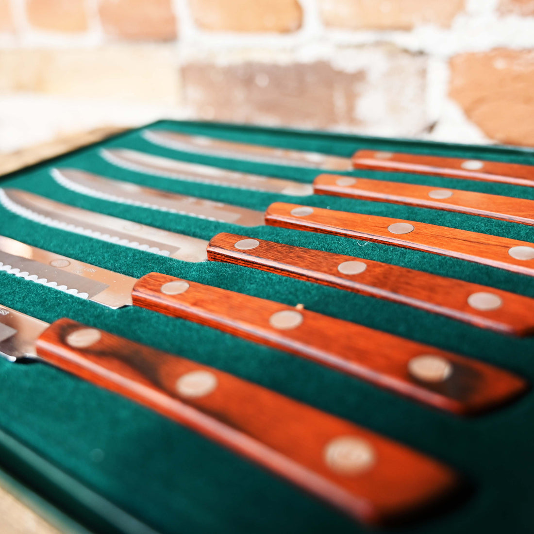 Moore Maker set of 6 steak knives with serrated stainless steel blades, rosewood handles, and gift box