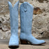 View of Macie Bean 15" baby blue suede boot with almond toe and cowgirl heel