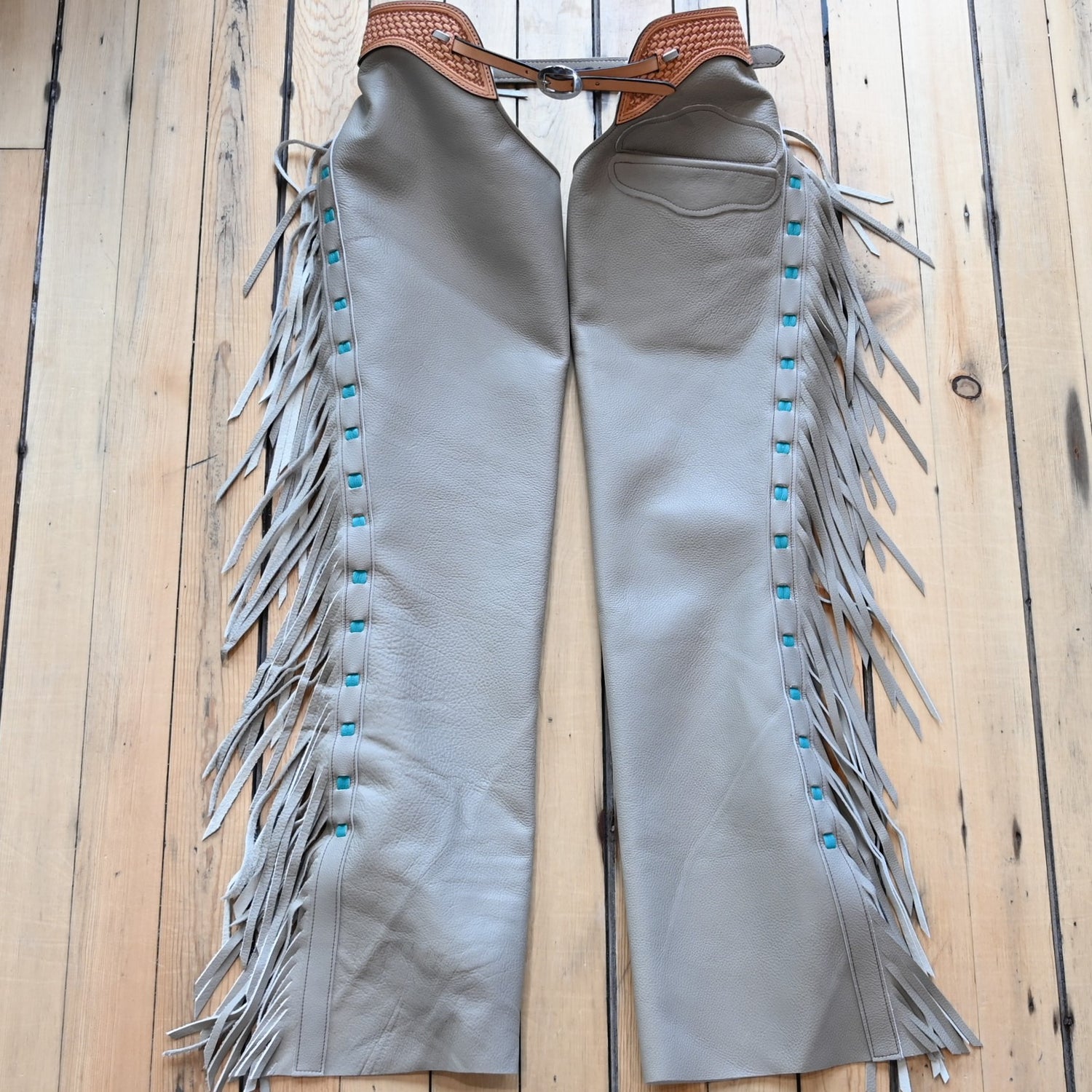 View of K Bar J Borderline Versatility Chap in Small with fringe and leather border