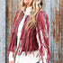 View of Double D Ranch Sonora Vest in Banjo Burgundy featuring full-length fringe and tonal leather lacing details