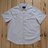 Howler Bros Broncbuster short-sleeve snapshirt in Sand with contrast piping.