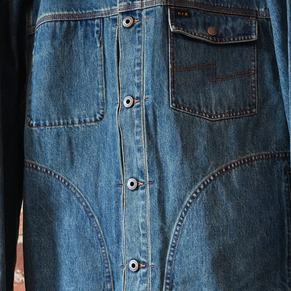 Howler Bros Denim Depot Jacket in Petty Mid Wash — front view, chest pocket, snap cuffs