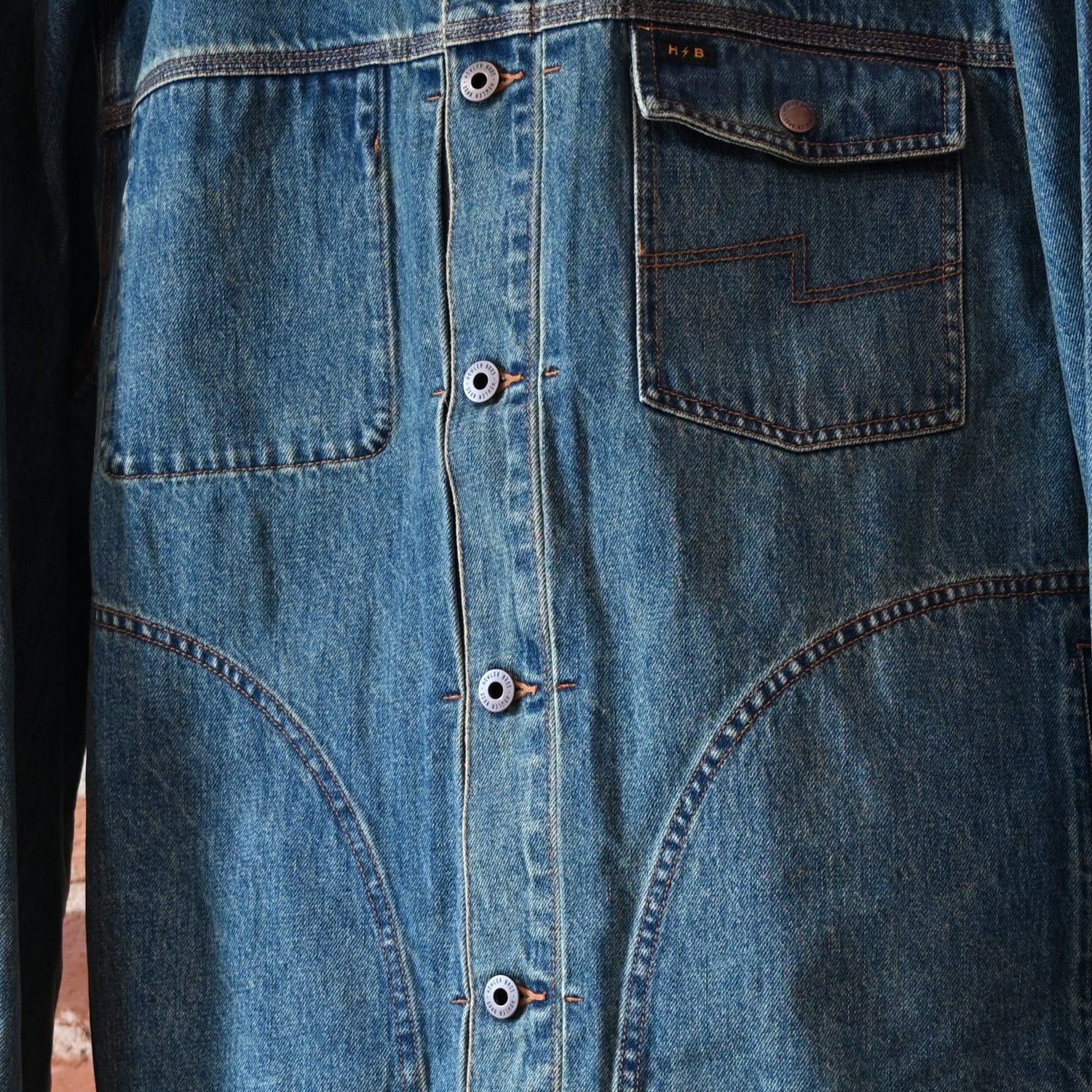 Howler Bros Denim Depot Jacket in Petty Mid Wash — front view, chest pocket, snap cuffs