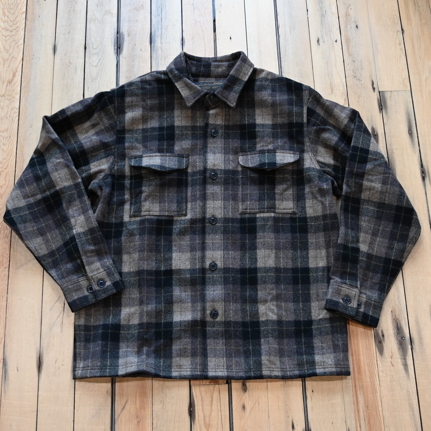 View of Filson Jac-Shirt featuring flap-covered chest pockets and straight hem