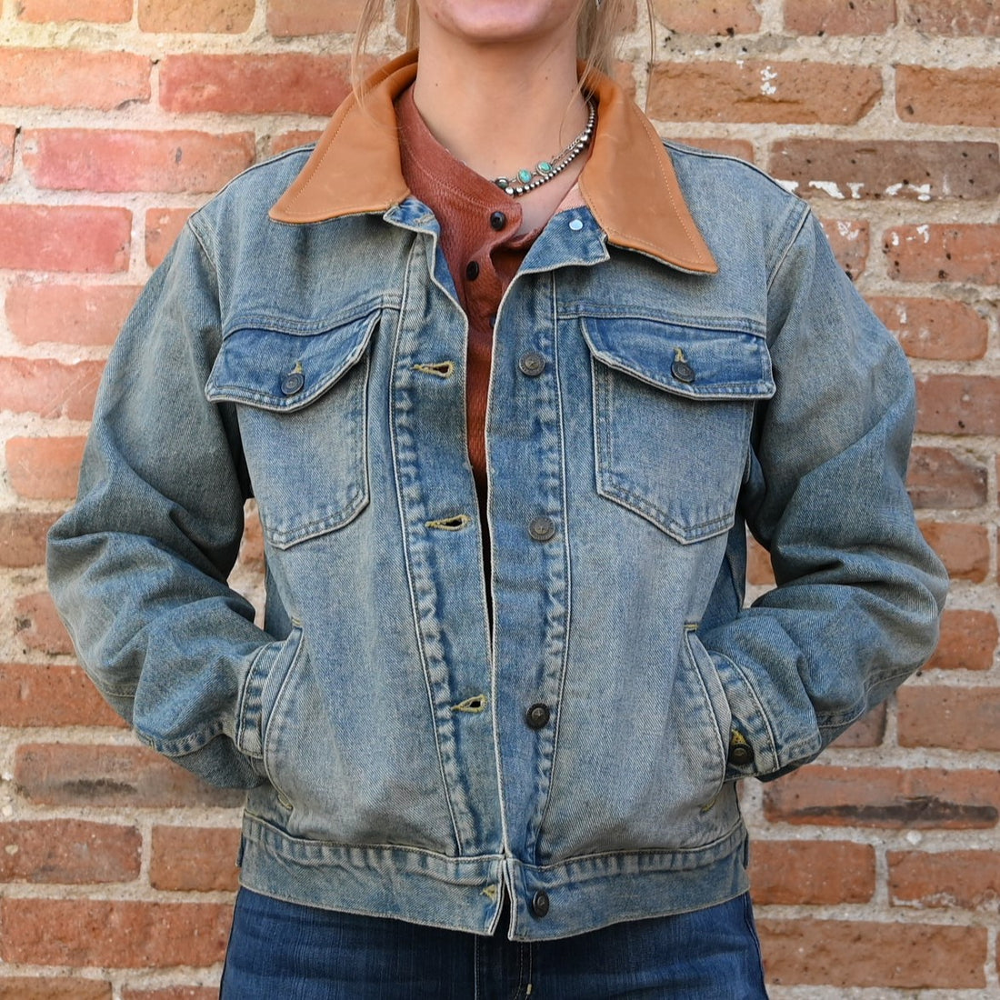 View of Schaefer ladies vintage-wash denim jacket with leather collar and flannel-lined sleeves