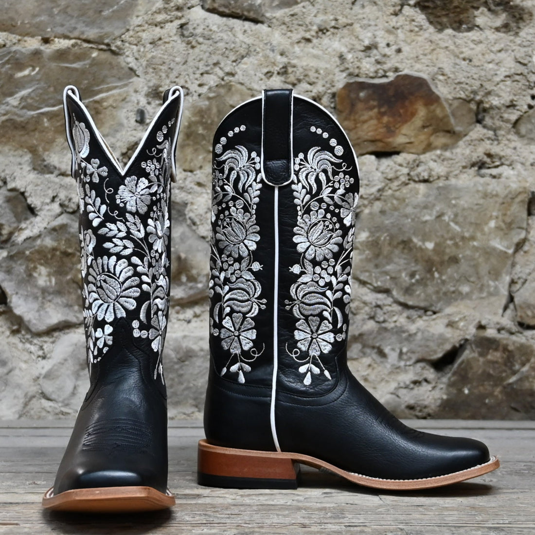 View of Macie Bean 13″ “Black Eyed Susan” boot with black leather and white floral stitching