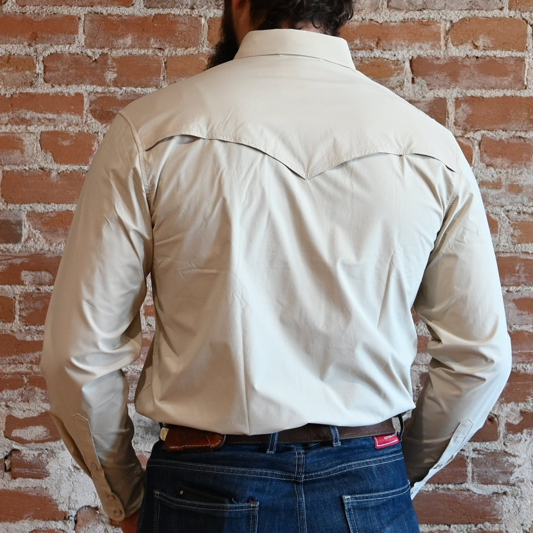 View of Schaefer khaki RangeTek Western snap shirt with mesh back vent and fleece-lined chest pockets