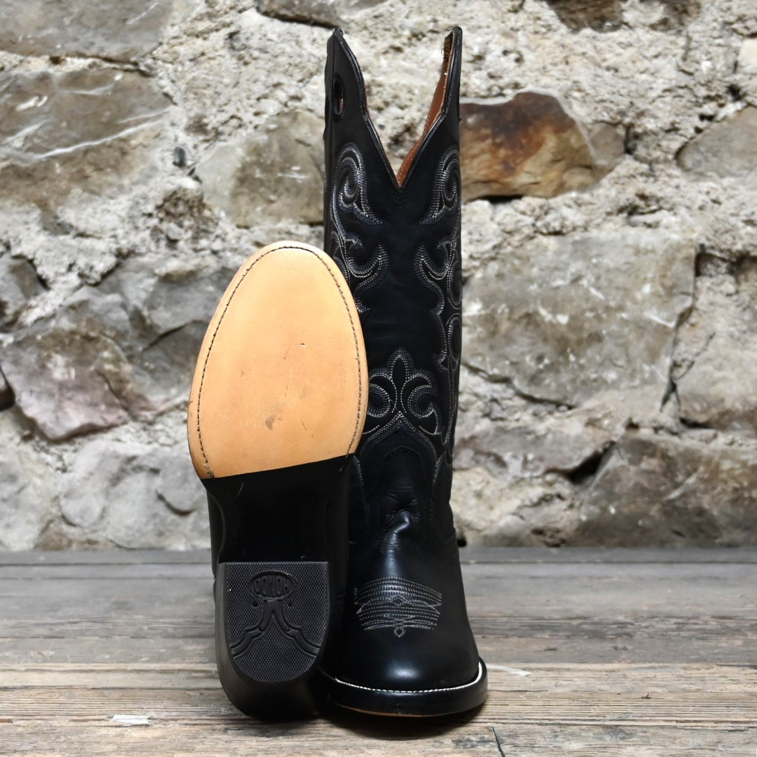 View of Hondo 16&quot; cowboy boot with black retan vamp, natural lined top, flourished stitching, and spur ledge