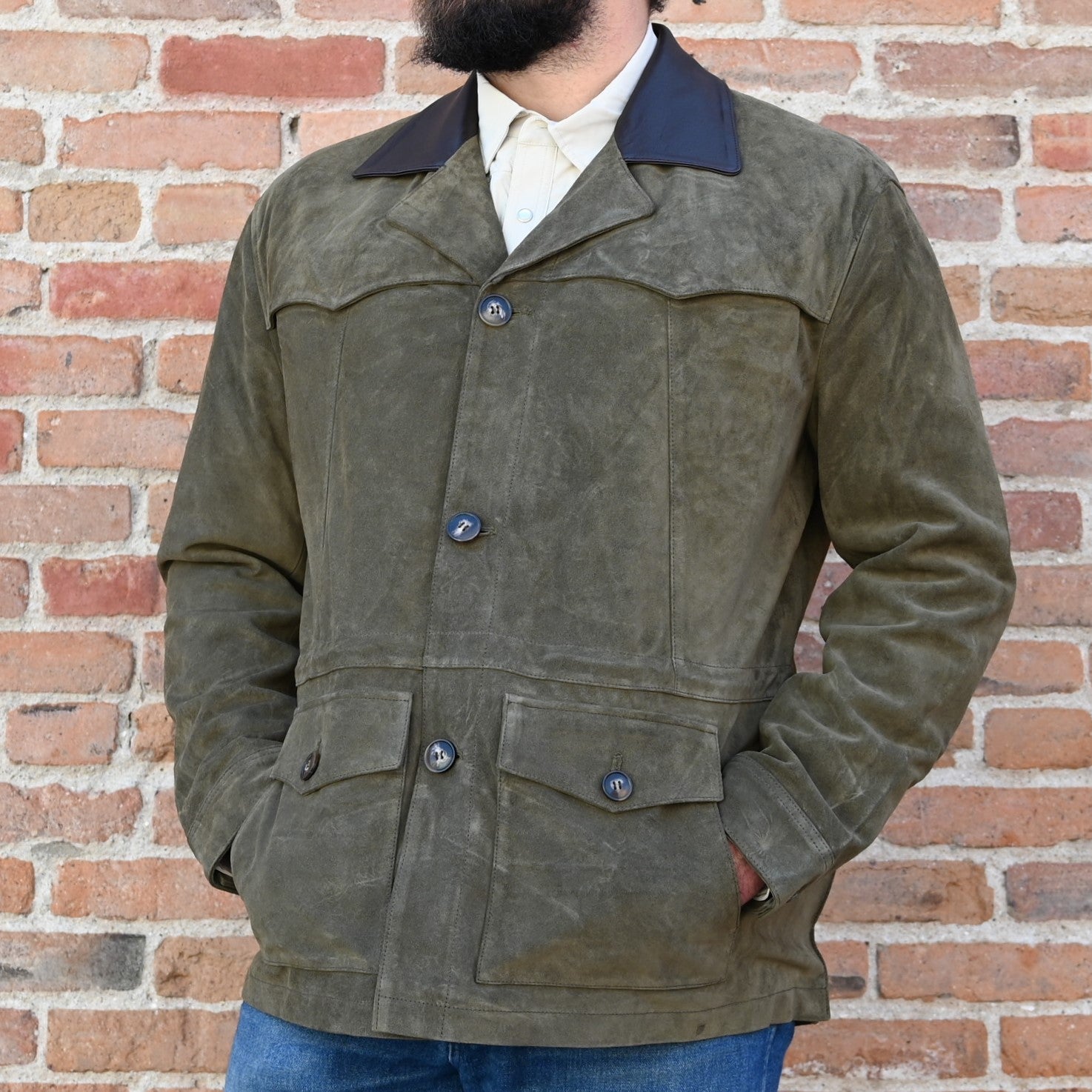View of Schaefer olive suede jacket with leather collar, button front, and Western fit