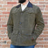 View of Schaefer olive suede jacket with leather collar, button front, and Western fit