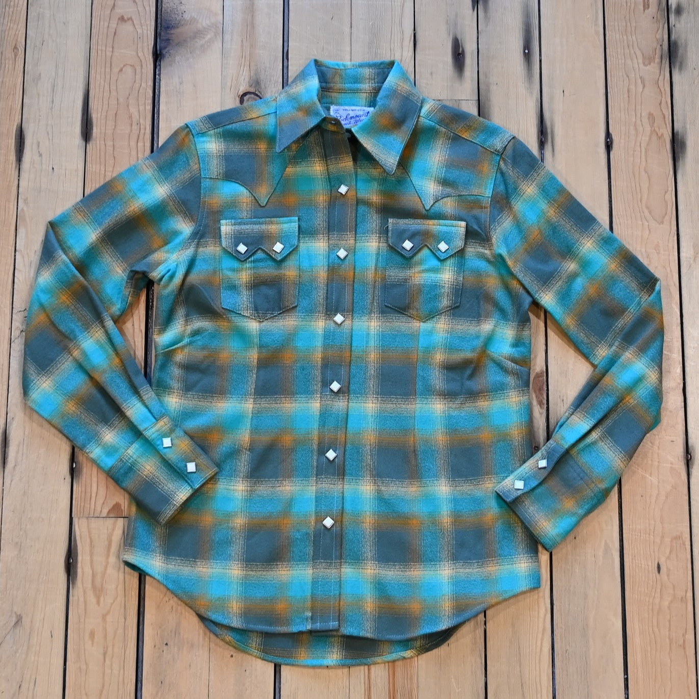 Ladies plush green and turquoise plaid flannel Western shirt with sawtooth pockets and diamond snaps