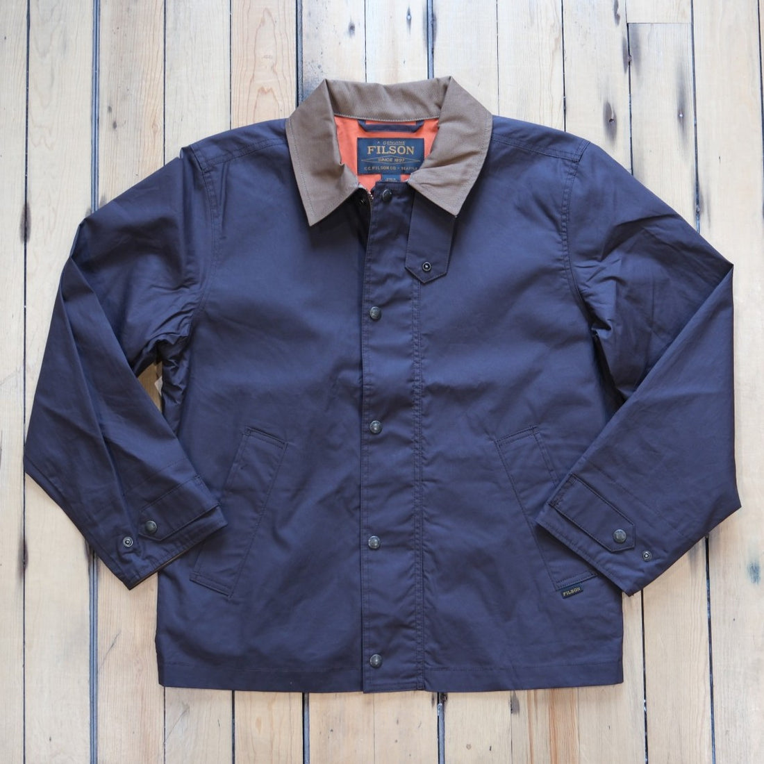 Filson Dry Wax Short Field Jacket in Dark Brown.