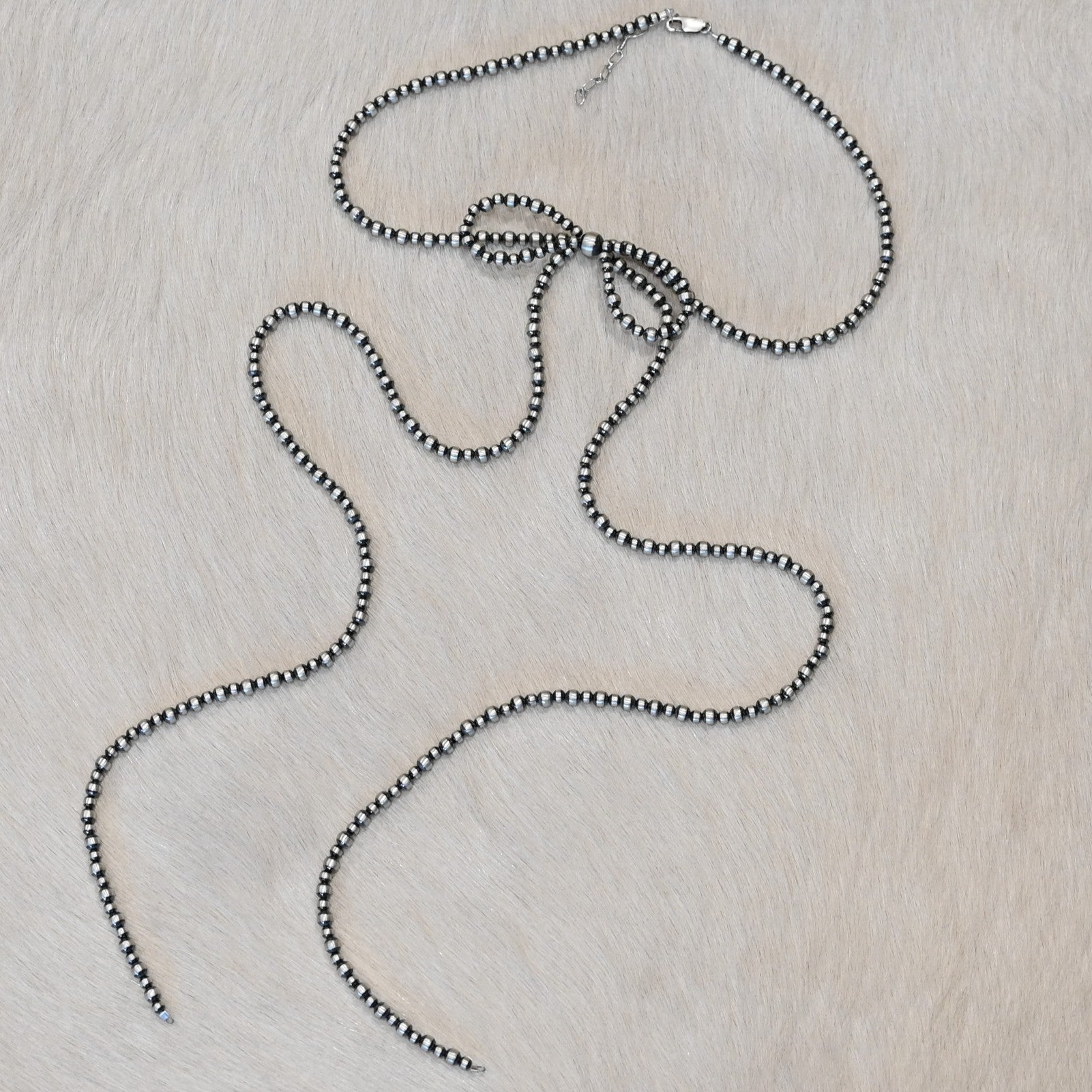 Sunwest Silver Long-Bow Oxybead Necklace with oxidized beads and cascading extra-long strands