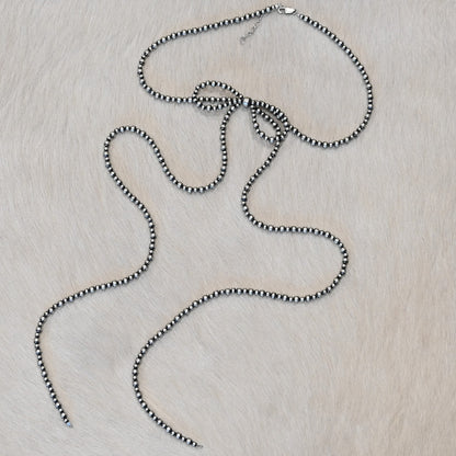 Sunwest Silver Long-Bow Oxybead Necklace with oxidized beads and cascading extra-long strands